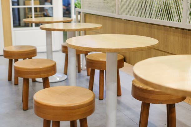 istock Brown wooden table and chair set for breakfast, lunch and dinner - interior concept. 872464004