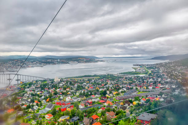 View from the cable car on Norwegian city Tromso. View from the cable car on Norwegian city Tromso.  Tromso is considered the northernmost city in the world with a population above 50,000. stavanger cathedral stock pictures, royalty-free photos & images