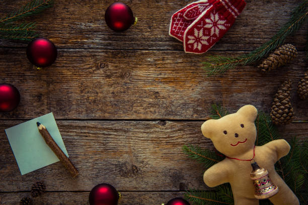 istock Christmas ornaments, teddy bear and sticky notes 872475442