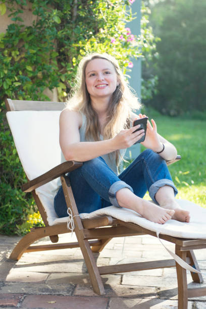 istock Young woman with cell phone 872476274