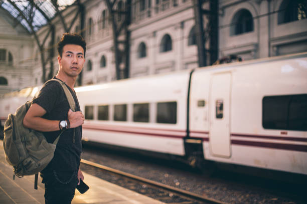 istock Man tourist leaving town 872476348