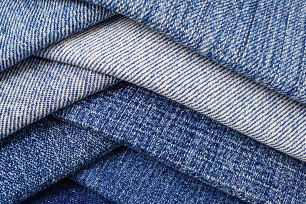 istock abstract backgroud of close up denim fabric 872479812