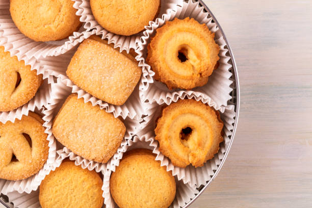istock Closeup of Danish butter cookies in tin with copyspace 872484178