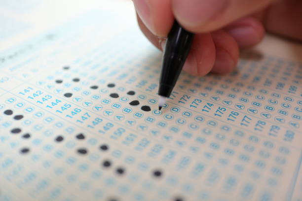 istock Hand on pencil choosing the test list on the examination 872487402