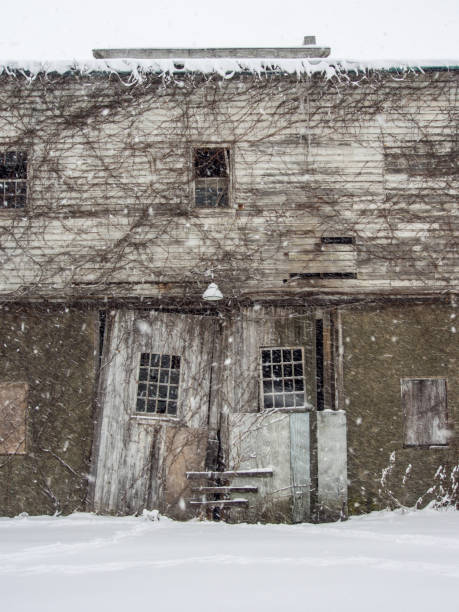 istock Old Barn Doorway in Snow 872490506
