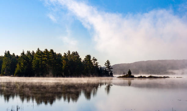 istock Foggy Morning on Lake in Maine 872490668