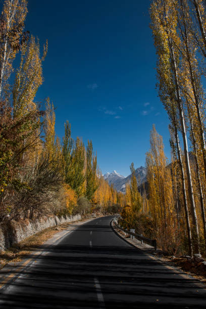 Road to Heaven This is the Karakoram Highway is a 1300 km national highway in Pakistan which extends from Hasan Abdal in Punjab province of Pakistan to the Khunjerab Pass in Gilgit-Baltistan, where it crosses into China and becomes China National Highway 314. karakoram highway stock pictures, royalty-free photos & images