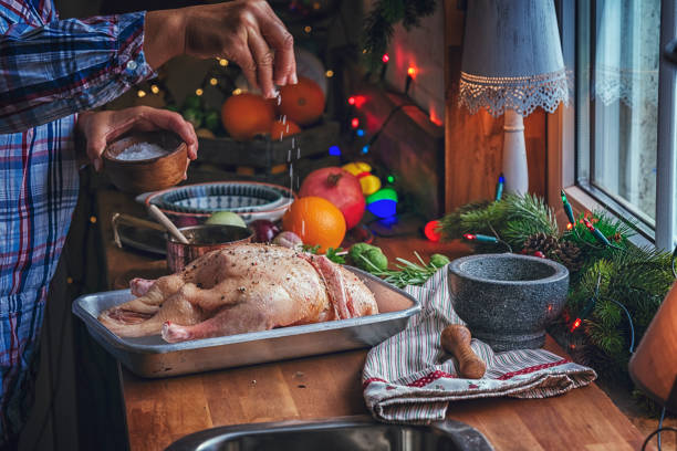 istock Preparing Traditional Christmas Duck for Holiday Dinner 872495972