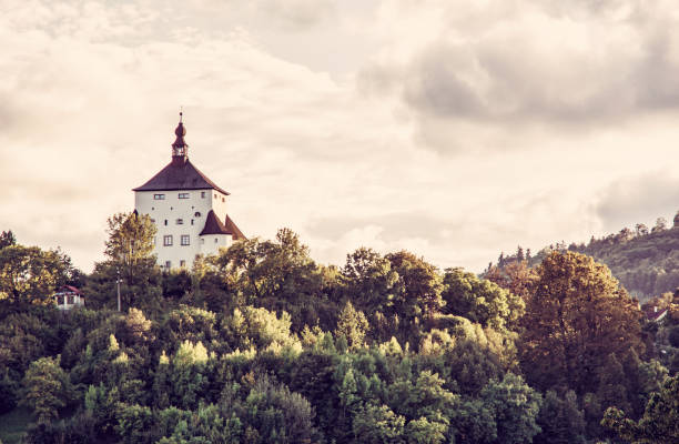 istock New Castle with forest in sunset, Banska Stiavnica, red filter 872515706