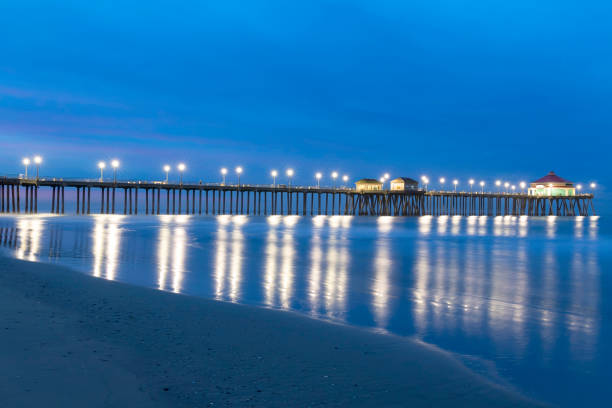 istock Beach pier with calm ocean during the winter 872524322