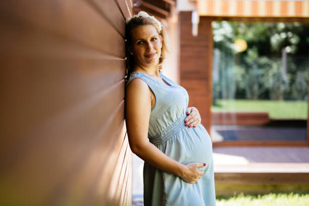 istock Beautiful pregnant woman 872526460