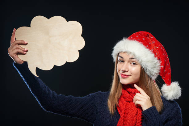 istock Xmas woman with thought bubble 872539716