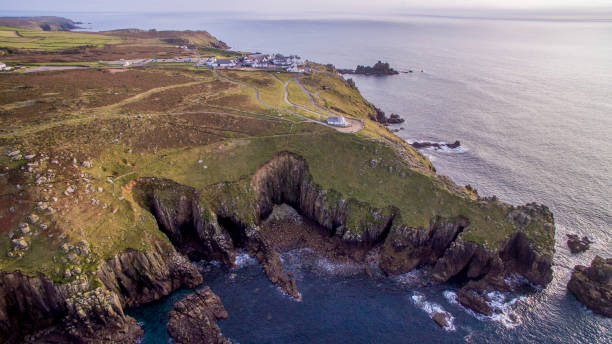 istock Aerial Drone Image of Lands End Whilst Sun is setting 872549302