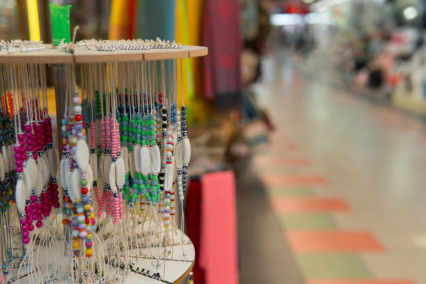 istock Souvenir shop, showcase with keychains and trinket 872552330