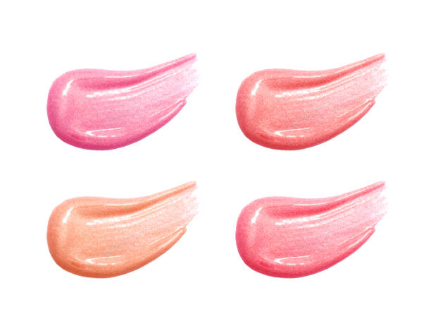 istock Set of different lip glosses smear samples isolated on white. Smudged makeup product sample. 872552574