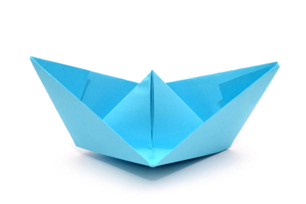 istock Blue paper boat. Origami boat isolated. 872552706