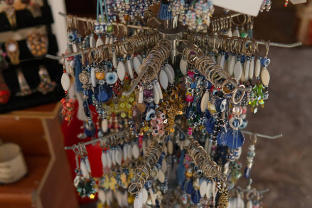 istock Souvenir shop, showcase with keychains and trinket 872553078