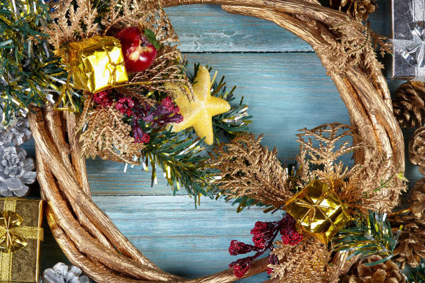 istock Christmas background with decorations and gift boxes on wooden board 872555190