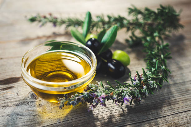 istock Olive oil with leaves and olives 872555208