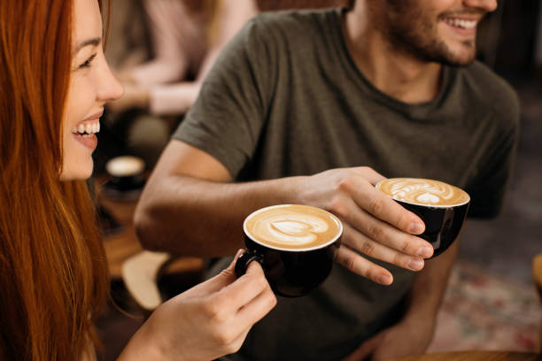 kaffee genießen - espresso men coffee shop drinking stock-fotos und bilder