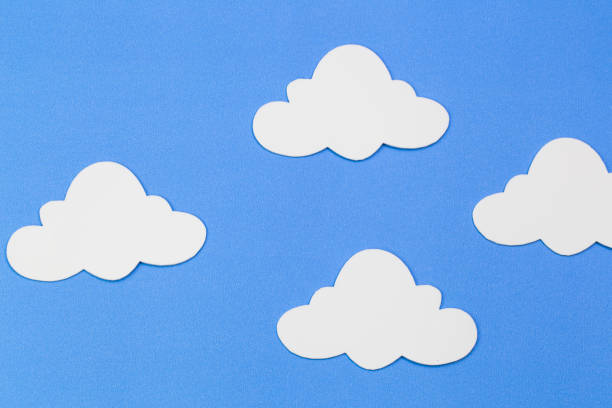 istock blue sky with clouds, frame, copyspace. Hand made felt toys. Abstract sky. 872557402