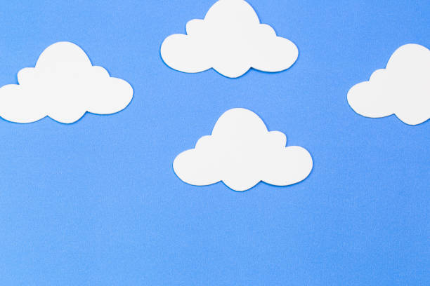 istock blue sky with clouds, frame, copyspace. Hand made felt toys. Abstract sky. 872557406
