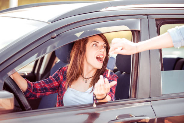istock Woman in car 872558640