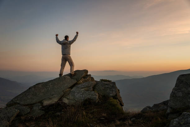 istock Happy male hiker on mountain top 872565966