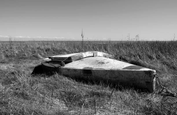istock Denmark: Fisherman’s special transport kayak on a salt marsh 872566104