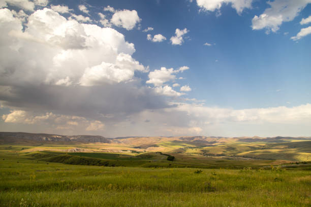 istock beautiful landscape with clouds in the sky 872569902