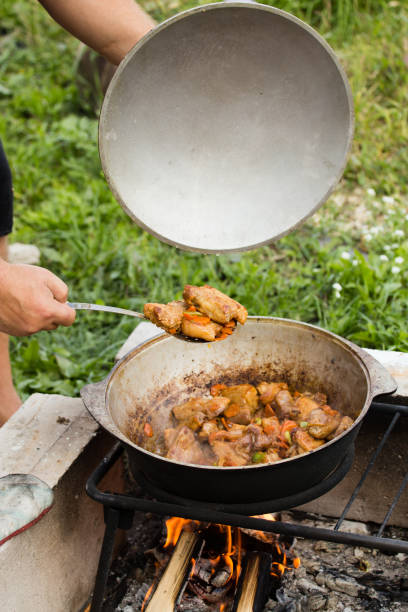 istock cooking in a cauldron at the stake 872571776