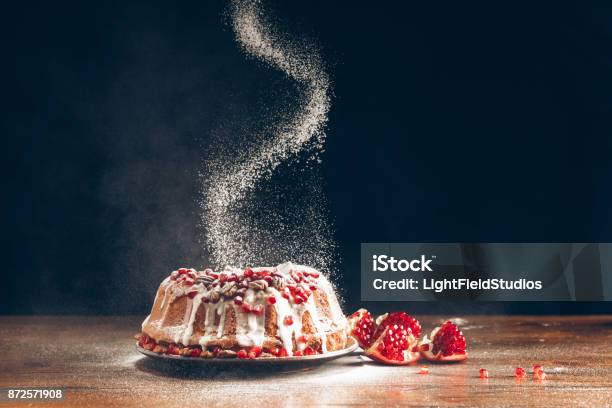 Christmas Cake Powdering With Icing Sugar Stock Photo - Download Image Now - Christmas, Dessert - Sweet Food, Christmas Cake