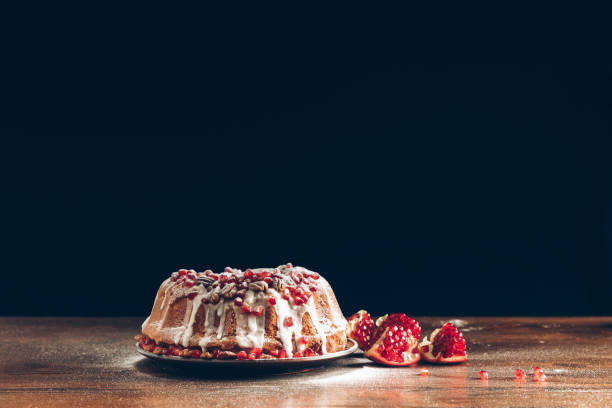 istock traditional christmas cake with pomegranate 872572604