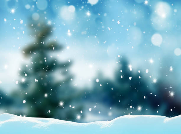 istock Christmas winter background with snow and blurred bokeh 872573112