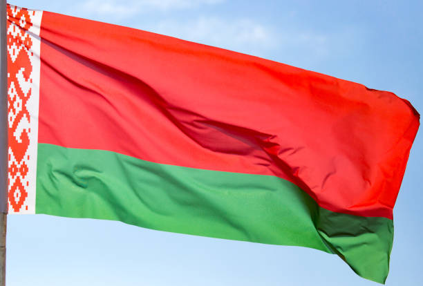 istock Flag of Belarus against the blue sky 872573298