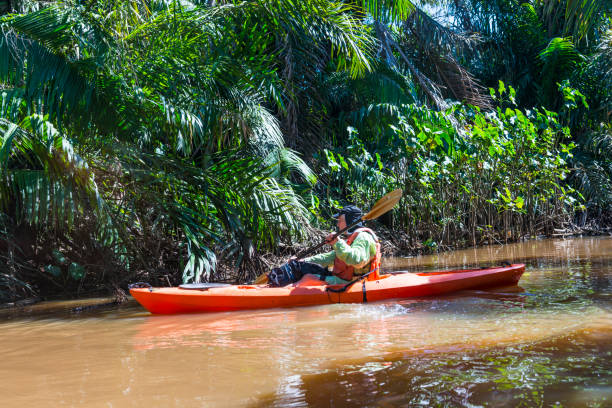 istock Man in kayak on the river Papaturro 872576006