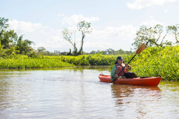 istock Man in kayak on the river Papaturro 872576112