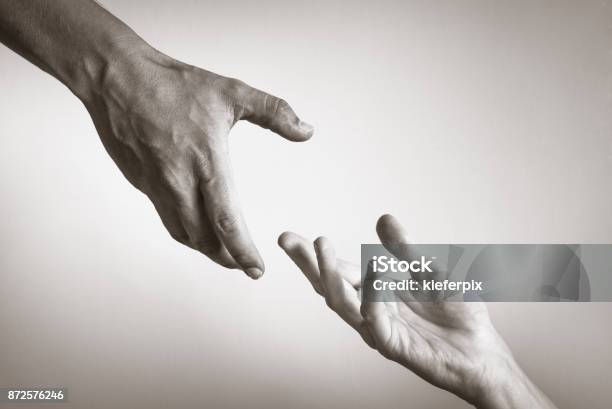 Helping Hand Stock Photo - Download Image Now - Reaching, Hand, Black And White