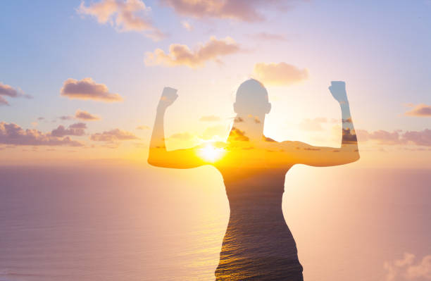 Women power! Double exposure image of strong woman. sunrise timelapse stock pictures, royalty-free photos & images