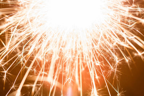 Long exposure photograph of a sparkler during the night.