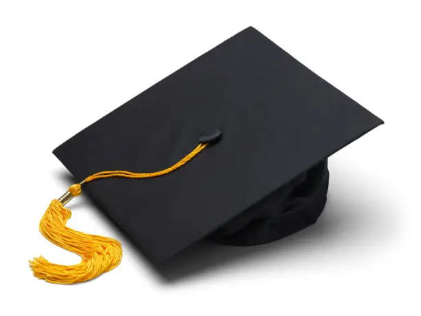 Black Mortar Board Cap with Yellow Tassel Isolated on White Background.