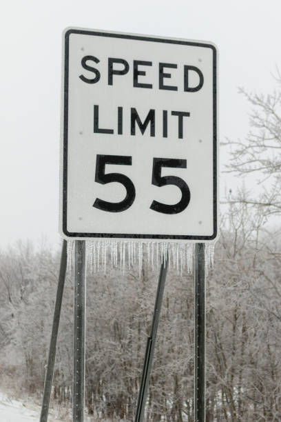 istock Winter Speed Limit Sign Frozen with Icicles 872583008