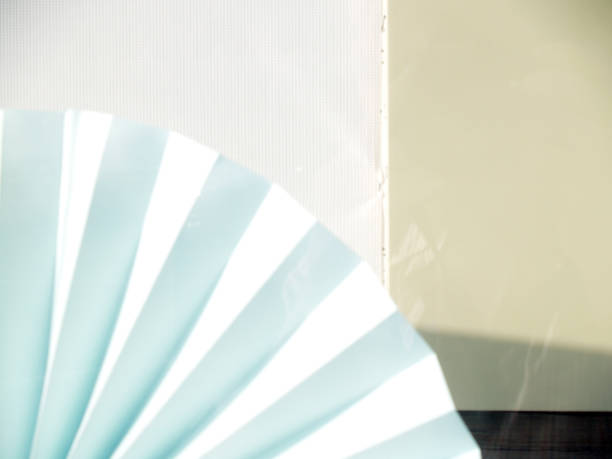 Blurred  abstract  indor compositon formed by blurred blue fan stock photo