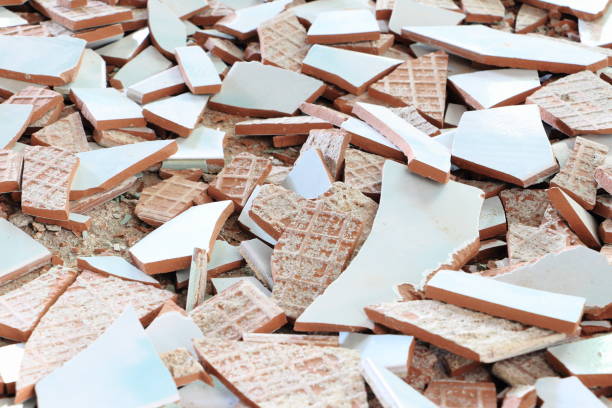 istock White ceramics fragments were scattered on the floor. 872590464