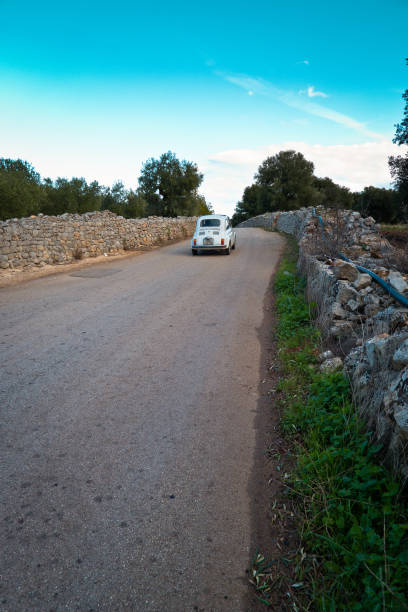 istock Old car run on the country road. 872594160