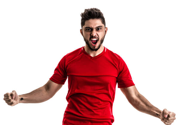 istock Fan / Sport Player on red uniform celebrating on white background 872597518