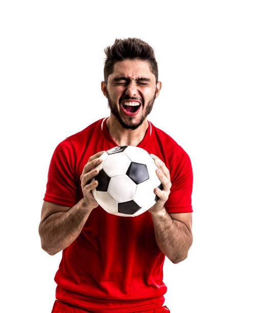 istock Fan / Sport Player on red uniform celebrating on white background 872597542