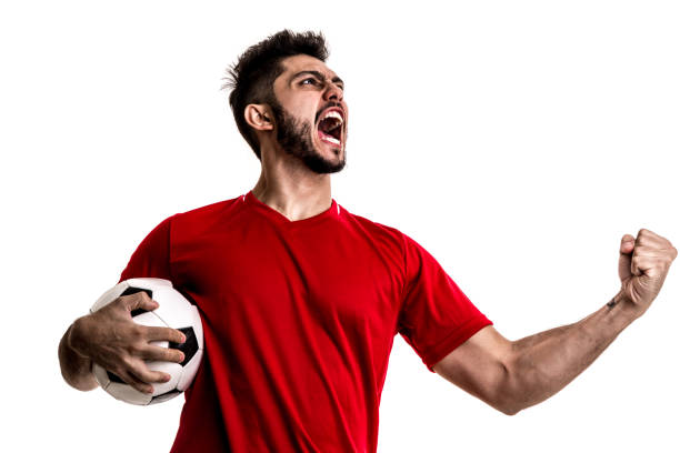 istock Fan / Sport Player on red uniform celebrating on white background 872597558
