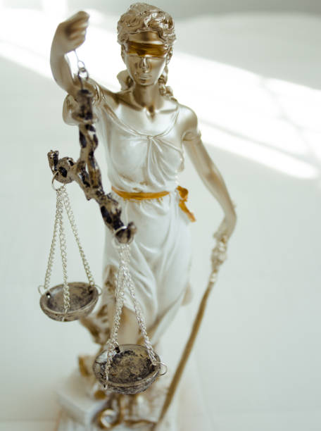 istock White female statue symbol of justice Themis 872597614