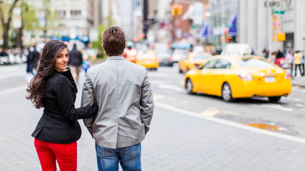 istock Young couple in New York City 872600916